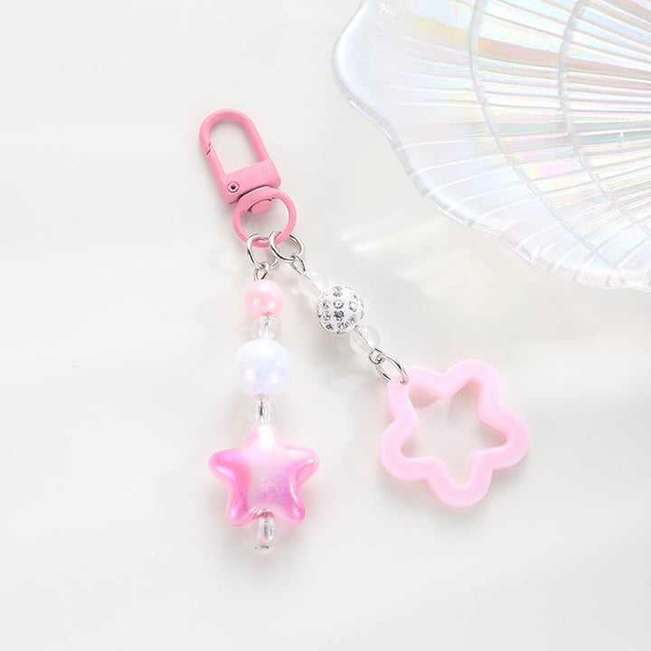 Playful keychain with floral and star motif Stornfield