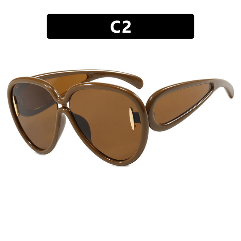 Women extravagant sunglasses in creative design Stornfield