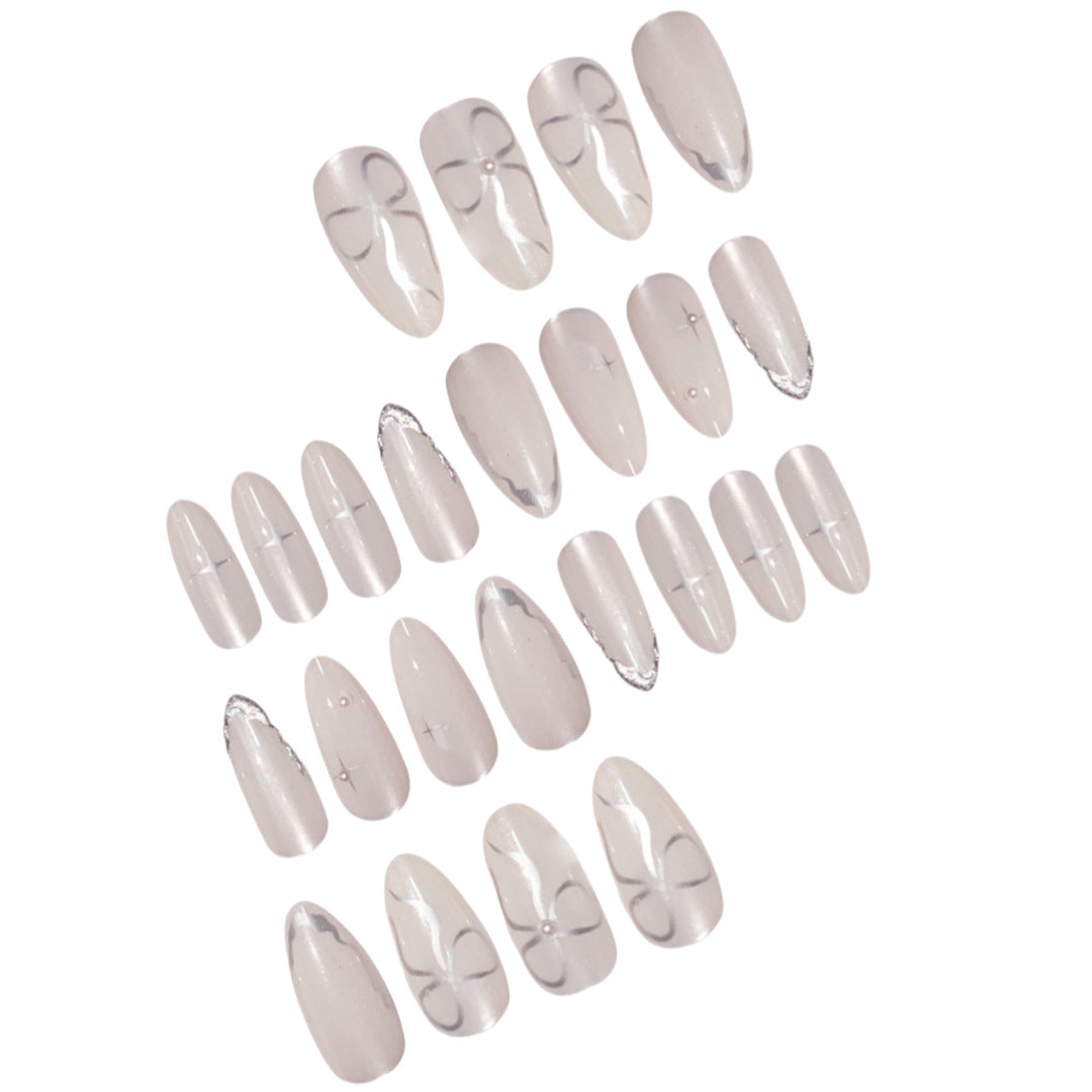 Elegant Stiletto Nail Art Extensions with Silver Accents Stornfield