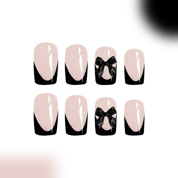 Artificial nail set with glamorous bow decorations Stornfield
