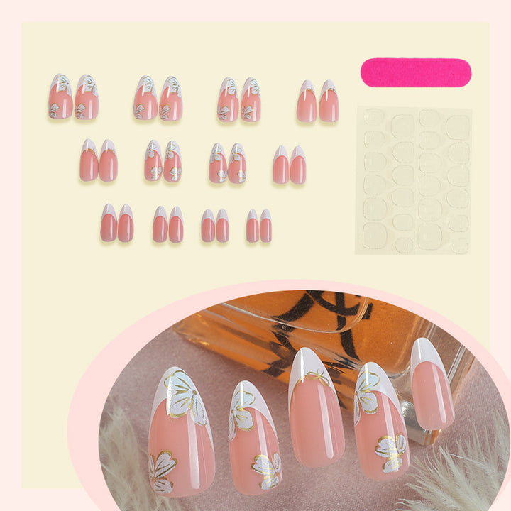 Artificial nail set with elegant flower and French tip design Stornfield