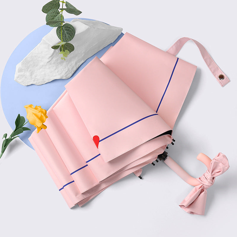 Ladies elegant folding umbrella with heart-shaped design Stornfield