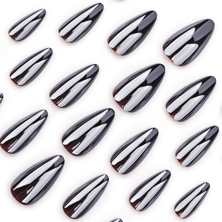 Elegant stiletto nails with reflective finish Stornfield