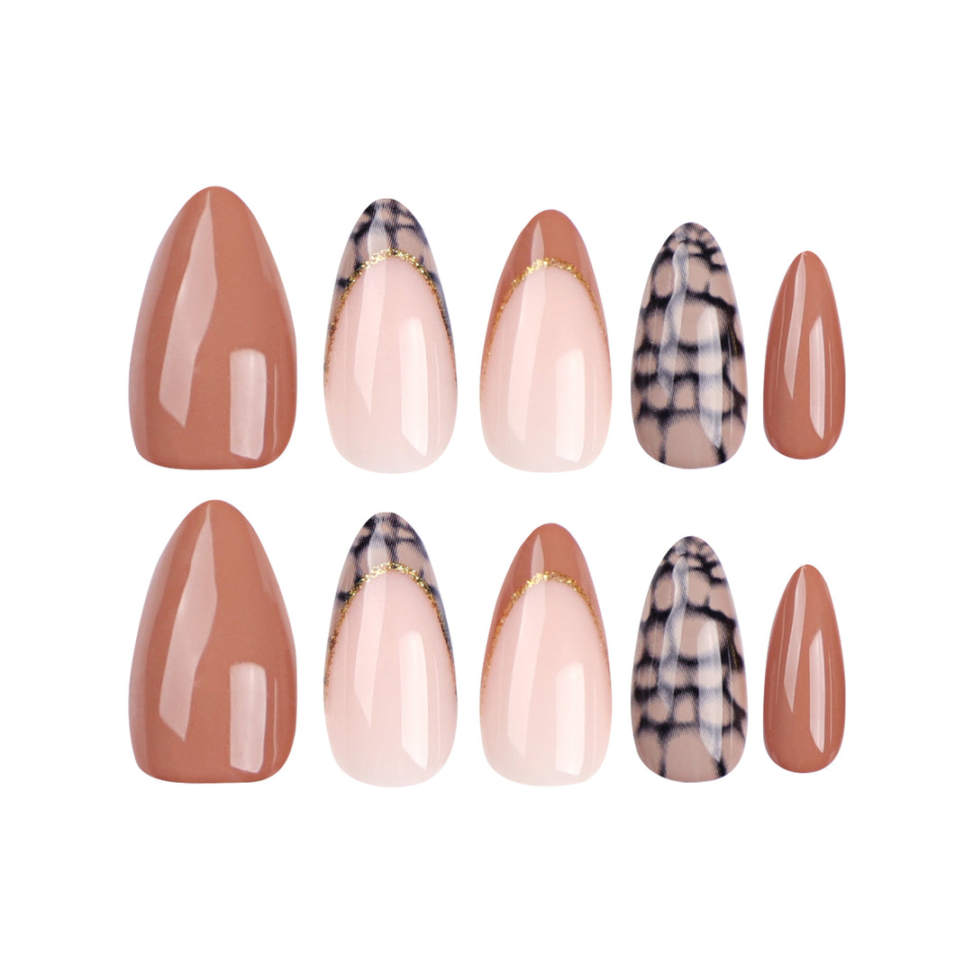Artful stiletto nails with elegant gold decoration Stornfield