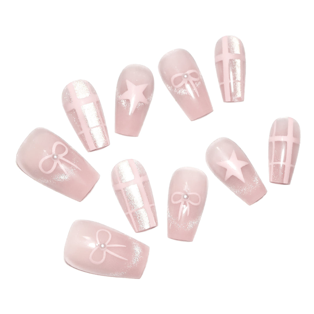 Artistic acrylic nails with elegant bow and star designs Stornfield