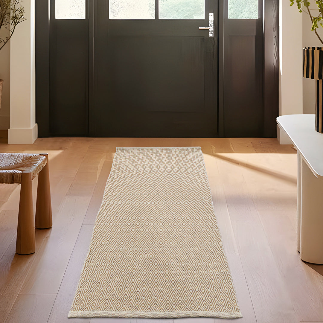 Modern runner made of handwoven cotton with geometric diamond pattern