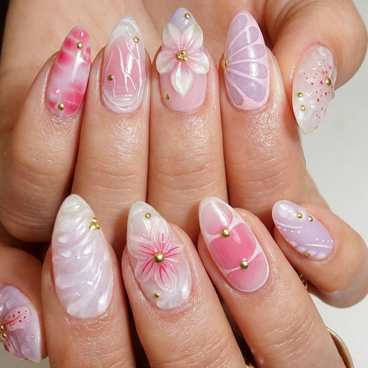 Acrylic nail set with elegant floral design and 3D accents Stornfield