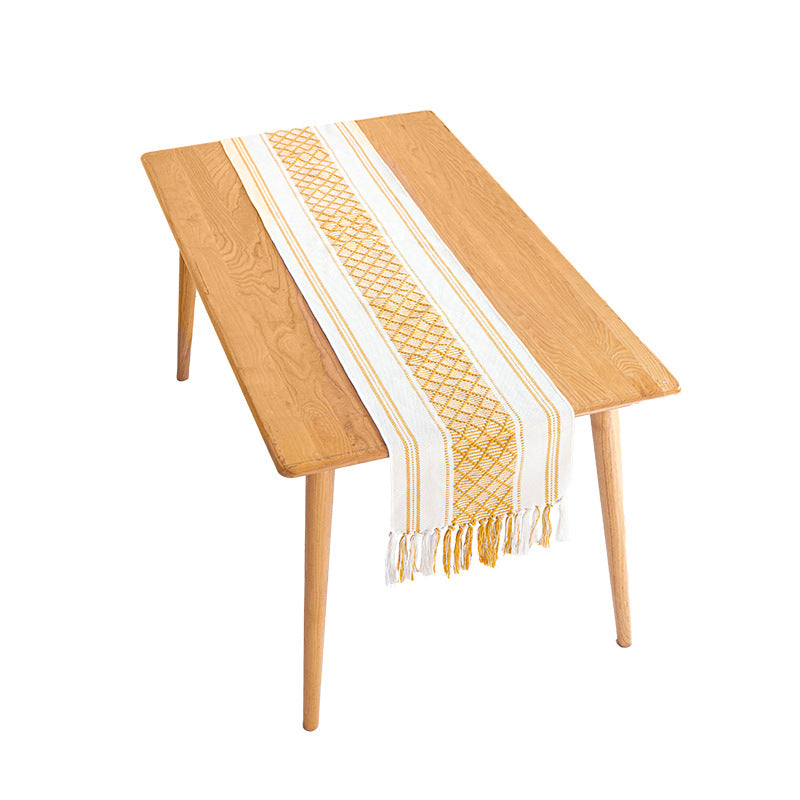 Handwoven cotton table runner with ethnic diamond pattern and fringes Stornfield