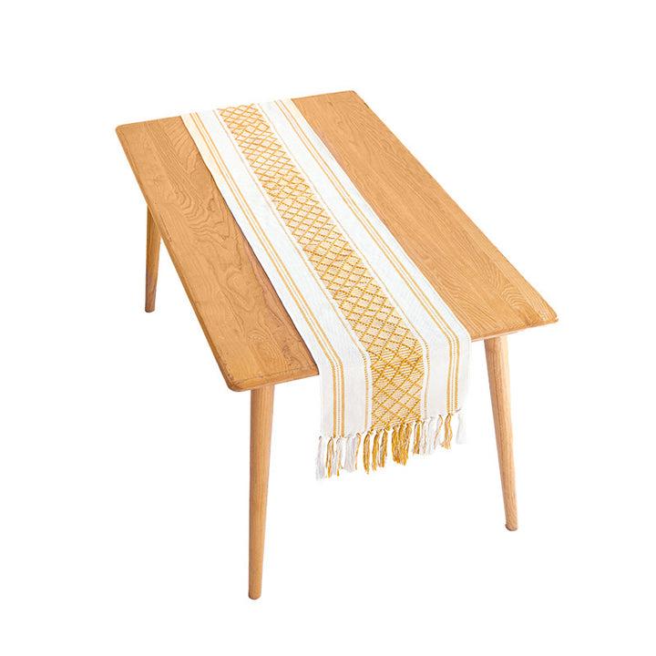 Handwoven cotton table runner with ethnic diamond pattern and fringes Stornfield