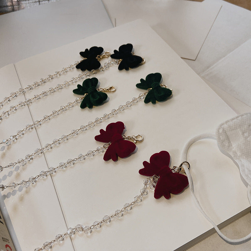 Jewelry holder chain with velvet bow pendant Stornfield