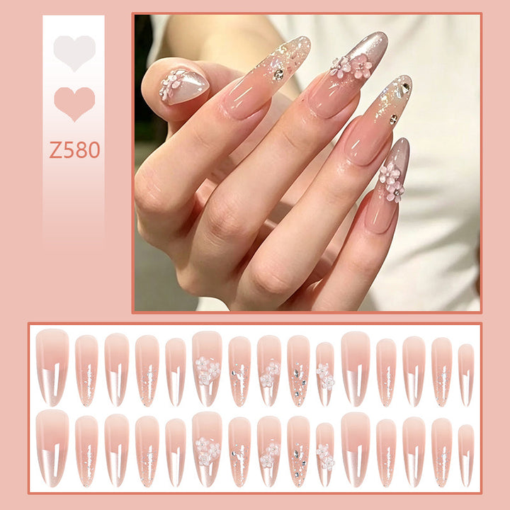 Nail art set with floral 3D applications and glitter accents Stornfield