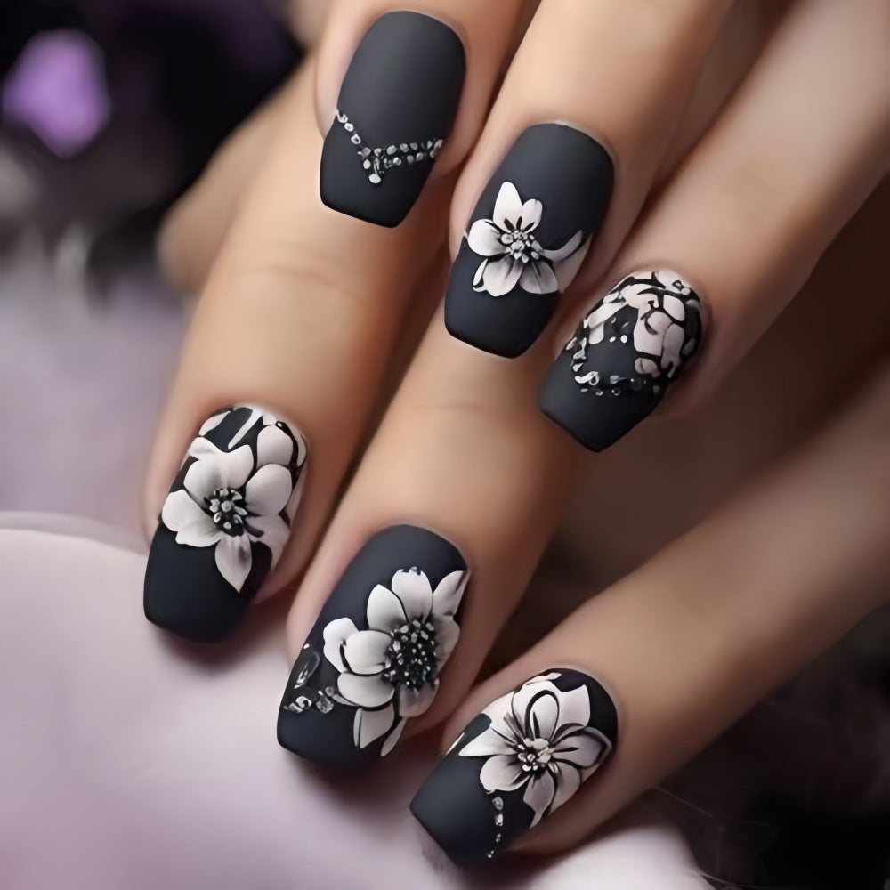 Artificial nails with elegant floral designs Stornfield