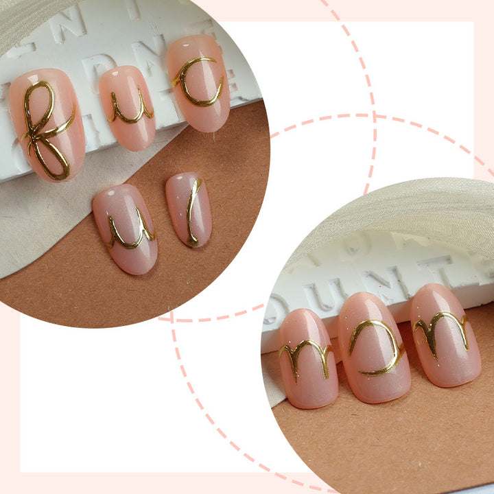 Elegant Press-On Nail Art Set with Stylish Gold Accents Stornfield