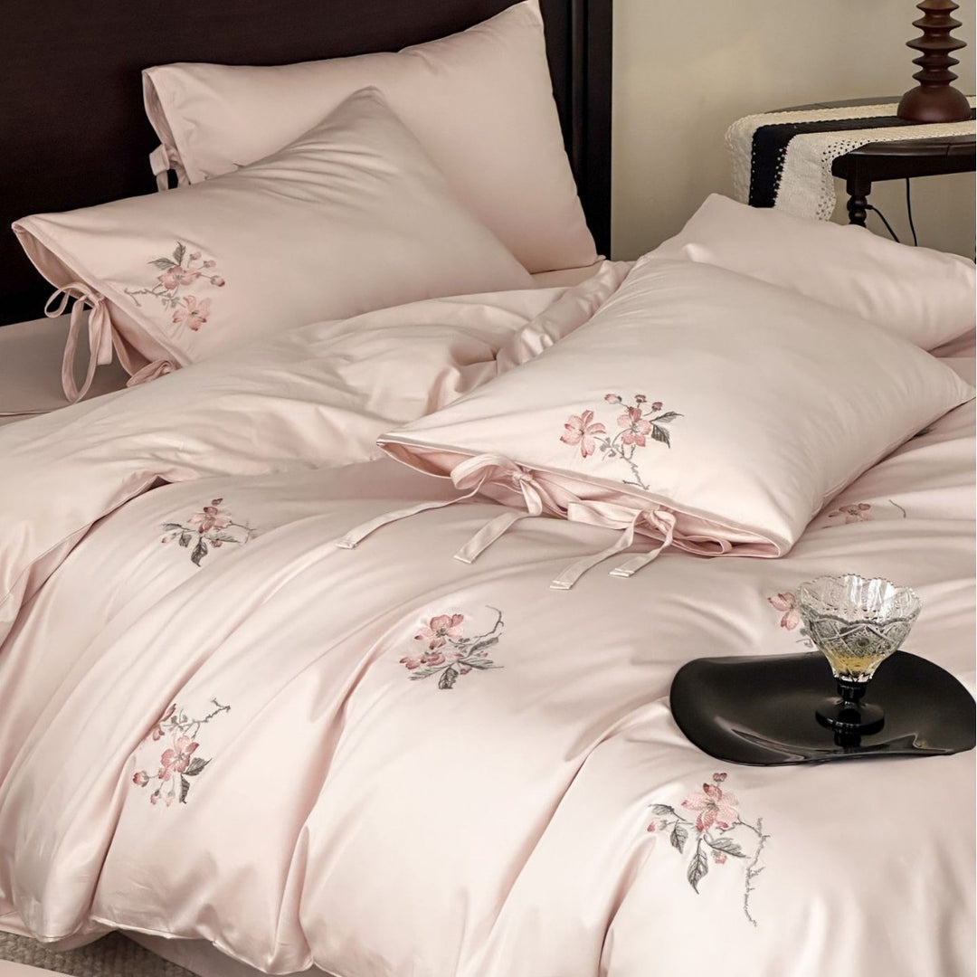Satin bed cover set with embroidered rose branches, bow ties and silky-matte finish