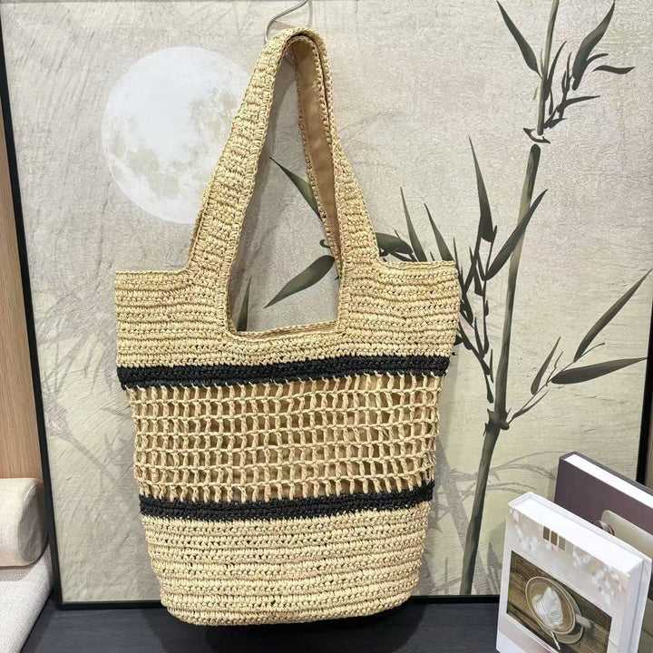 Woven natural material handbag with elegant structure Stornfield