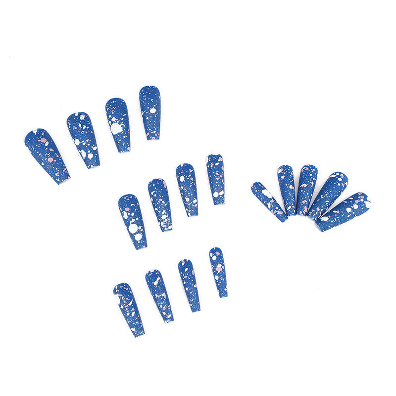 Artistic splatter design artificial nails Stornfield