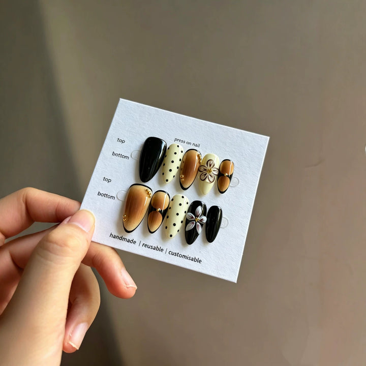 Artistic Press-On Nail Set with Reusable Floral and Polka Dot Designs