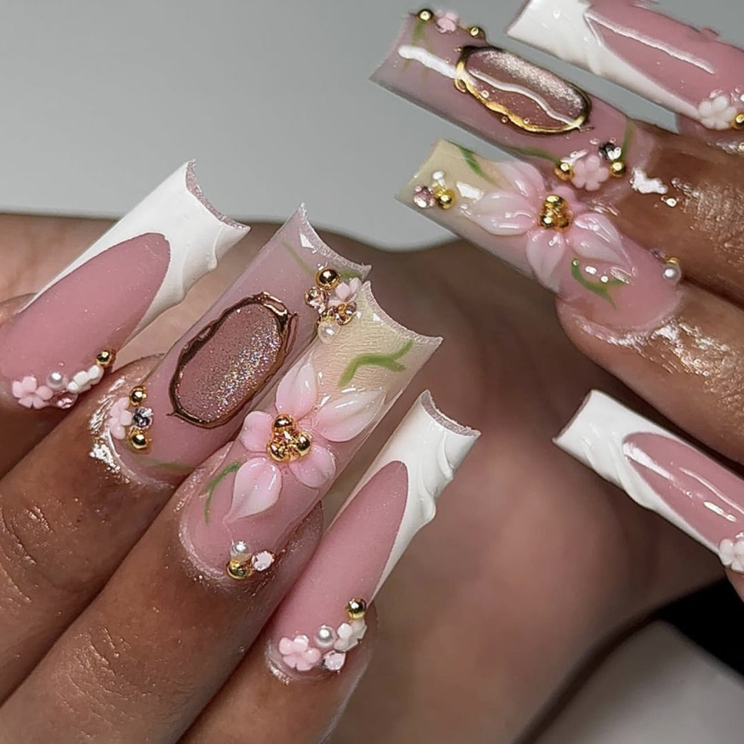 Artful nail extensions with floral embellishments Stornfield