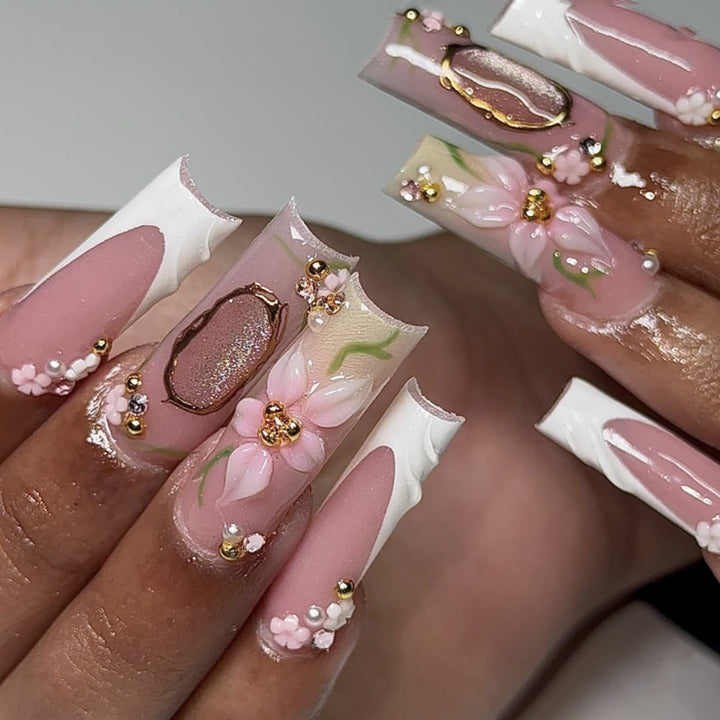 Artful nail extensions with floral embellishments Stornfield