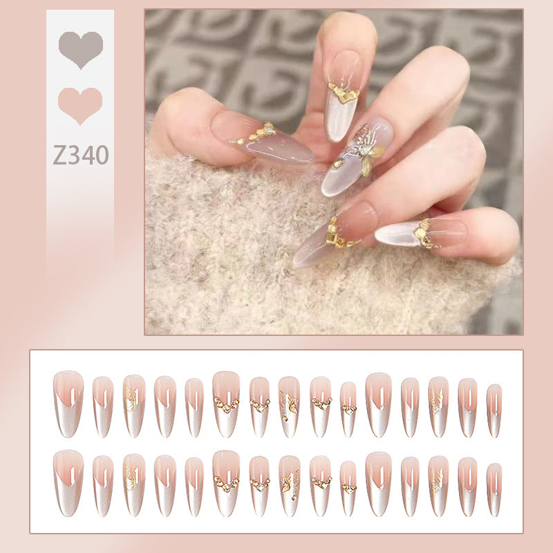 Glamorous art nails with elegant golden details Stornfield