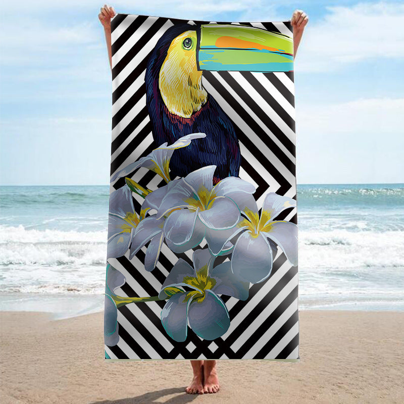 Beach towel with tropical flamingo pattern Stornfield
