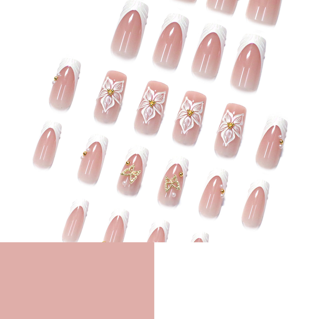 Elegant artificial nails with floral design and gold accents Stornfield