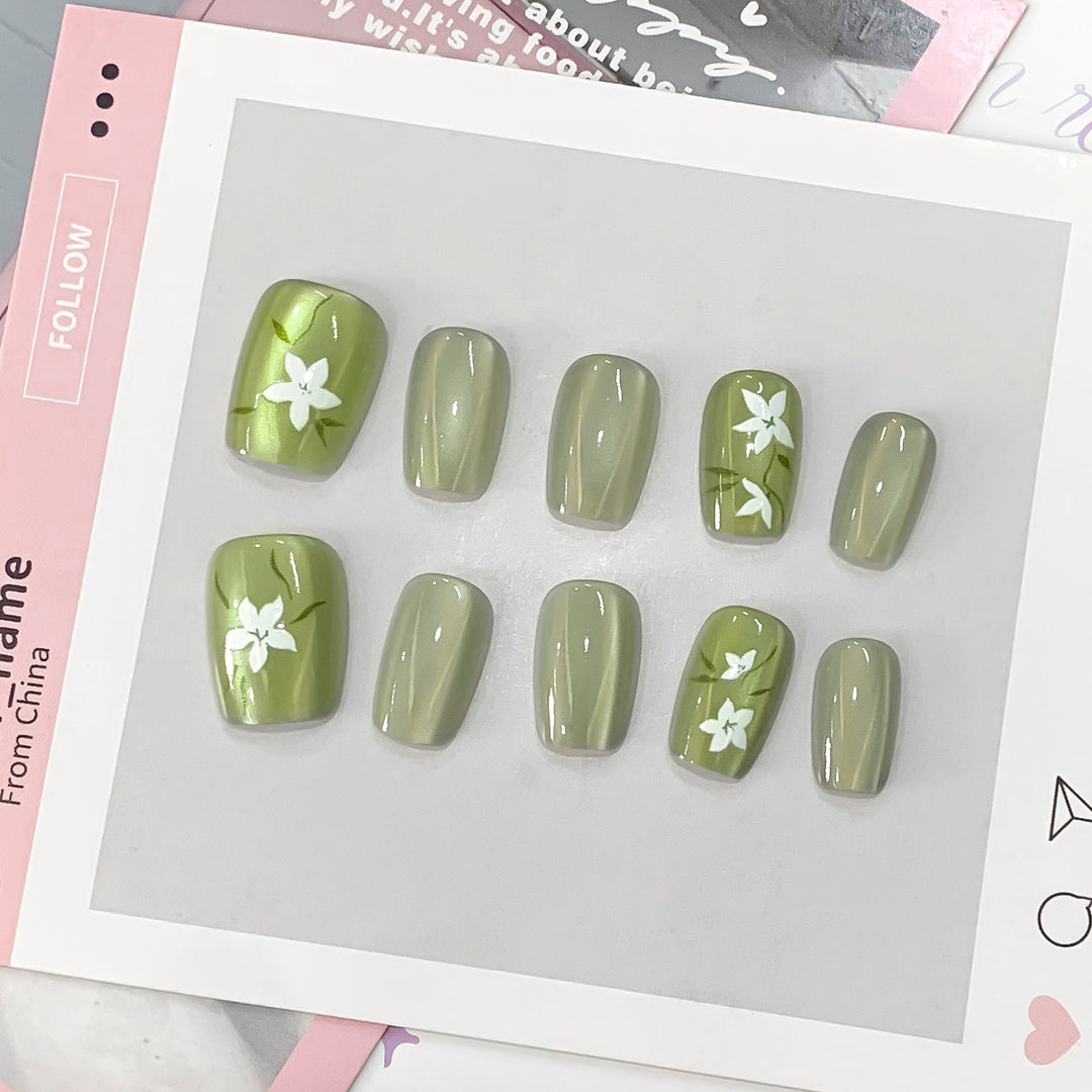 Artistic acrylic nails with floral design Stornfield