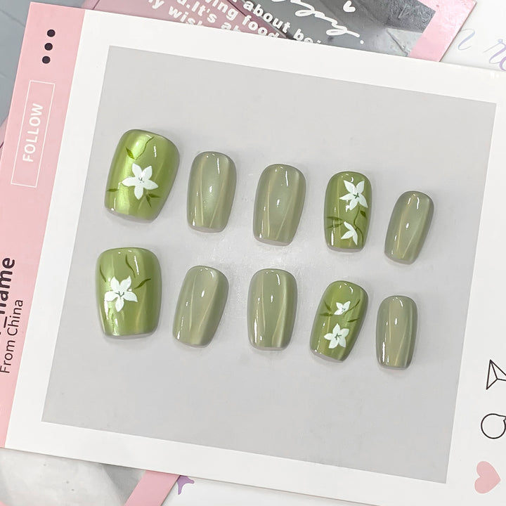 Artistic acrylic nails with floral design Stornfield