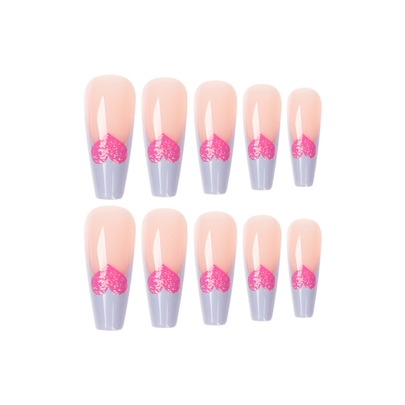 Artful stiletto nails with colorful heart designs Stornfield