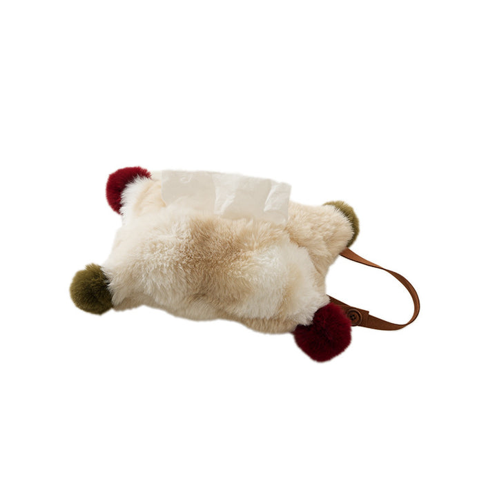 Handy tissue storage made of faux fur with leather handle and pompom