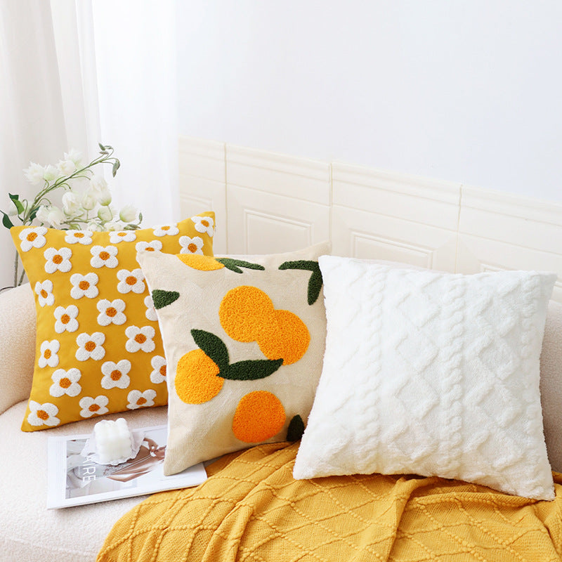 Square decorative cushion cover with hand-tufted citrus motif and textured fabric Stornfield