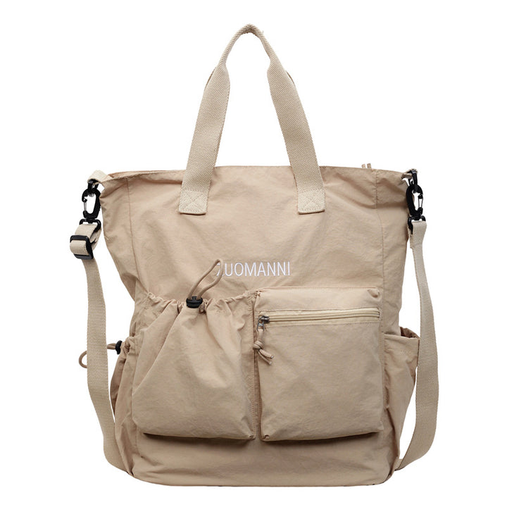 Tote bag with multifunctional outer pockets and adjustable shoulder strap Stornfield