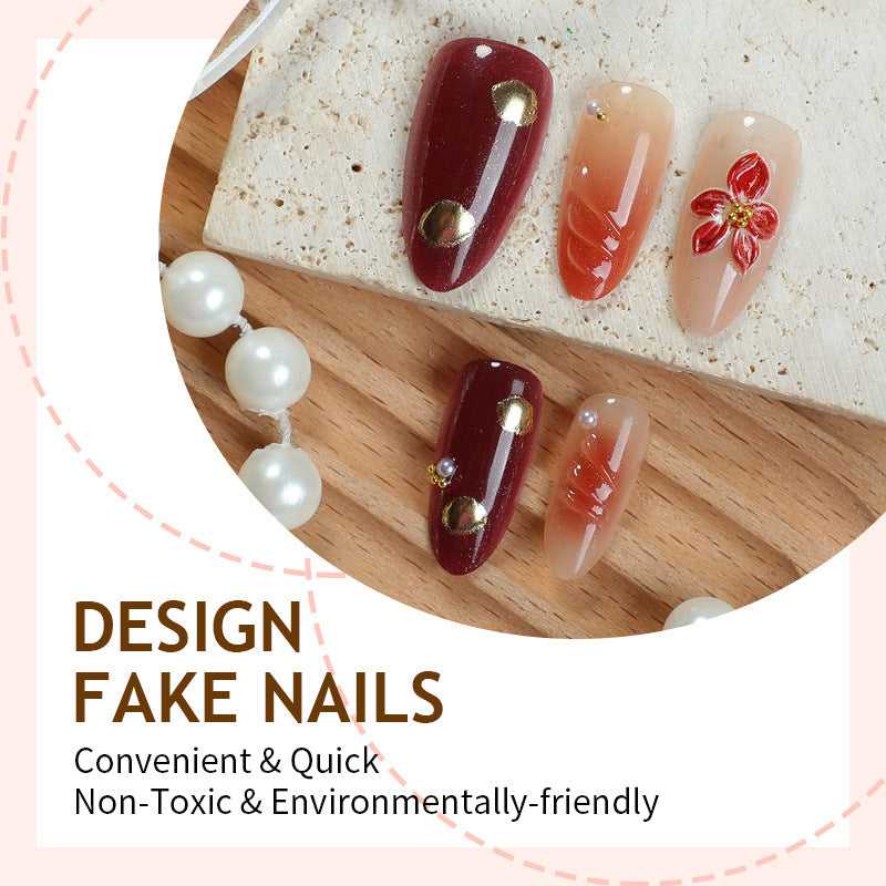 Acrylic nail set with elegant floral design and shimmering accents Stornfield