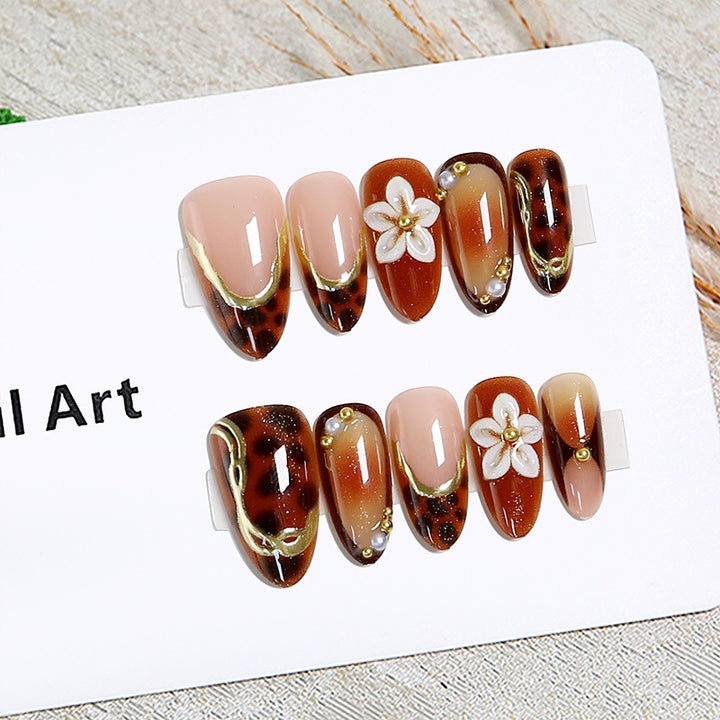 Elegant artificial nails with floral and animal motifs Stornfield