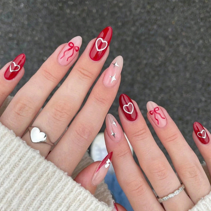 Artificial nail set with romantic hearts and bows Stornfield