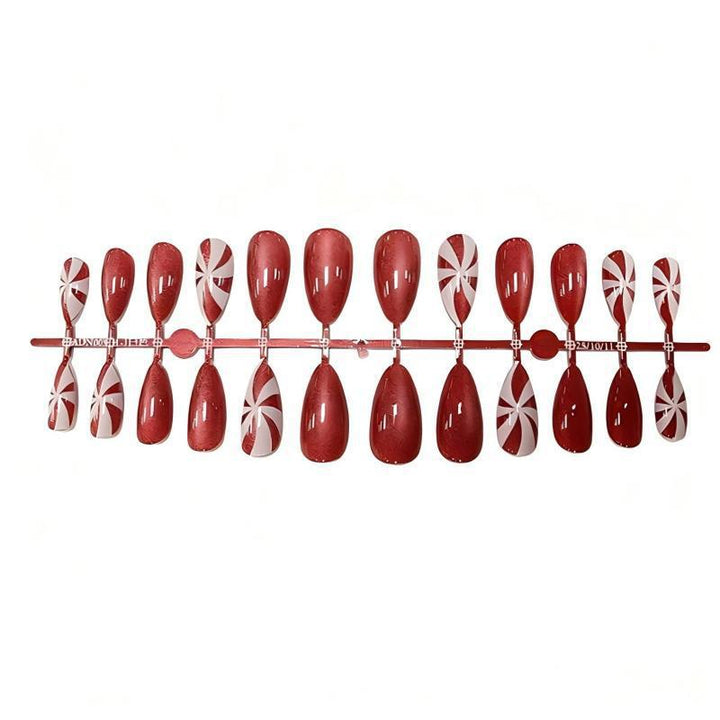 Art nail set with festive candy cane design Stornfield