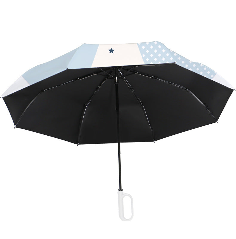 Women's folding umbrella with unique star pattern and practical carrying bag Stornfield
