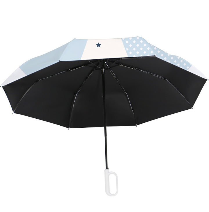Women's folding umbrella with unique star pattern and practical carrying bag Stornfield