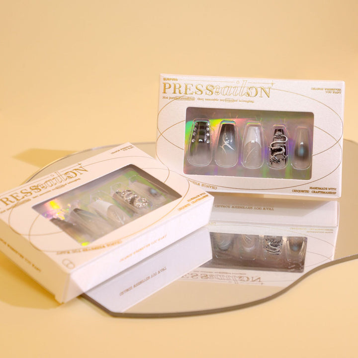Artistic acrylic nails in elegant ombre design with elaborate details Stornfield