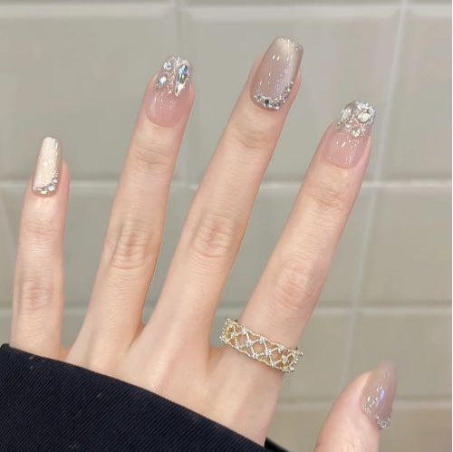 Artificial nails with sweet animal motif and elegant French tip Stornfield
