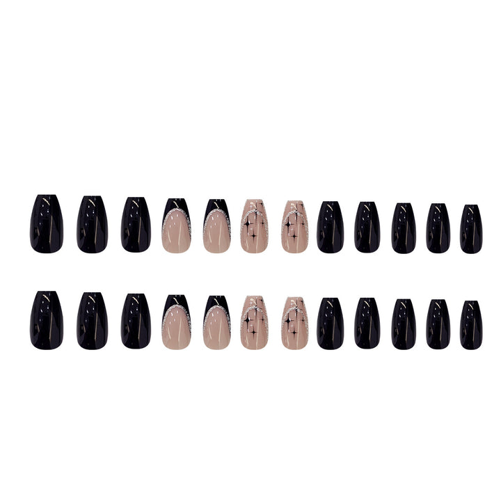 Elegant and artistic stiletto artificial nails with glitter embellishments Stornfield