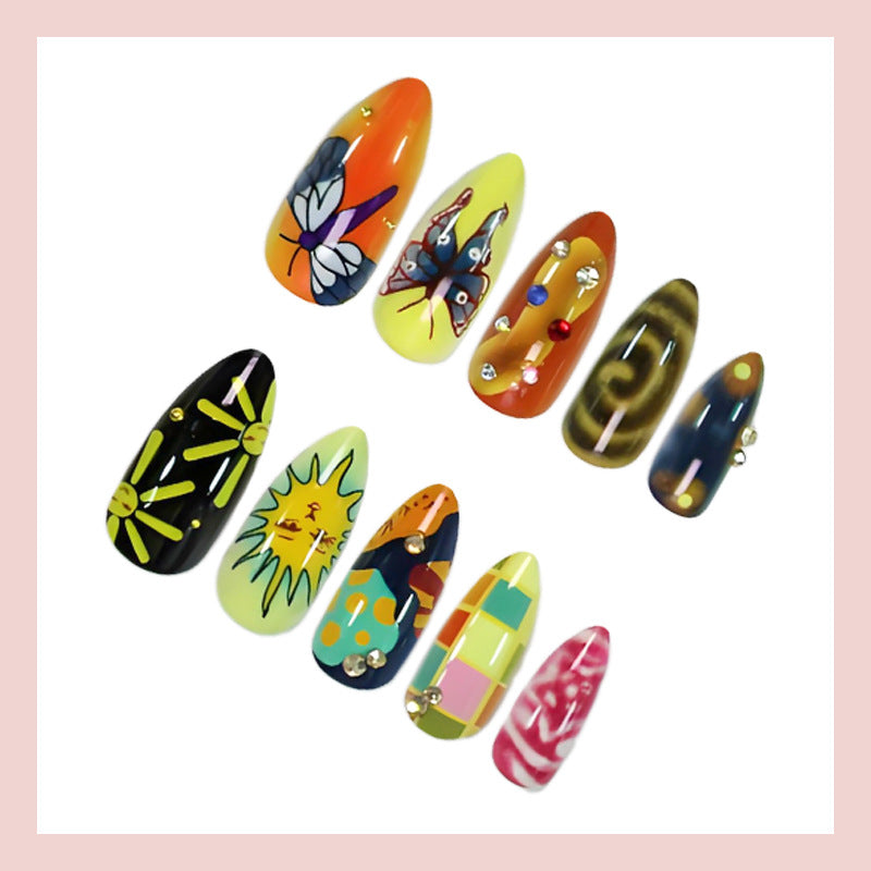 Acrylic nail set with creative summer motifs and sparkling accents Stornfield