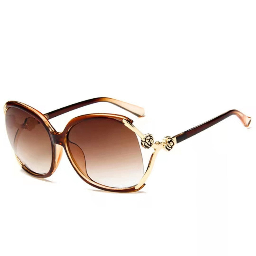 Ladies elegant oversized sunglasses with golden accents Stornfield