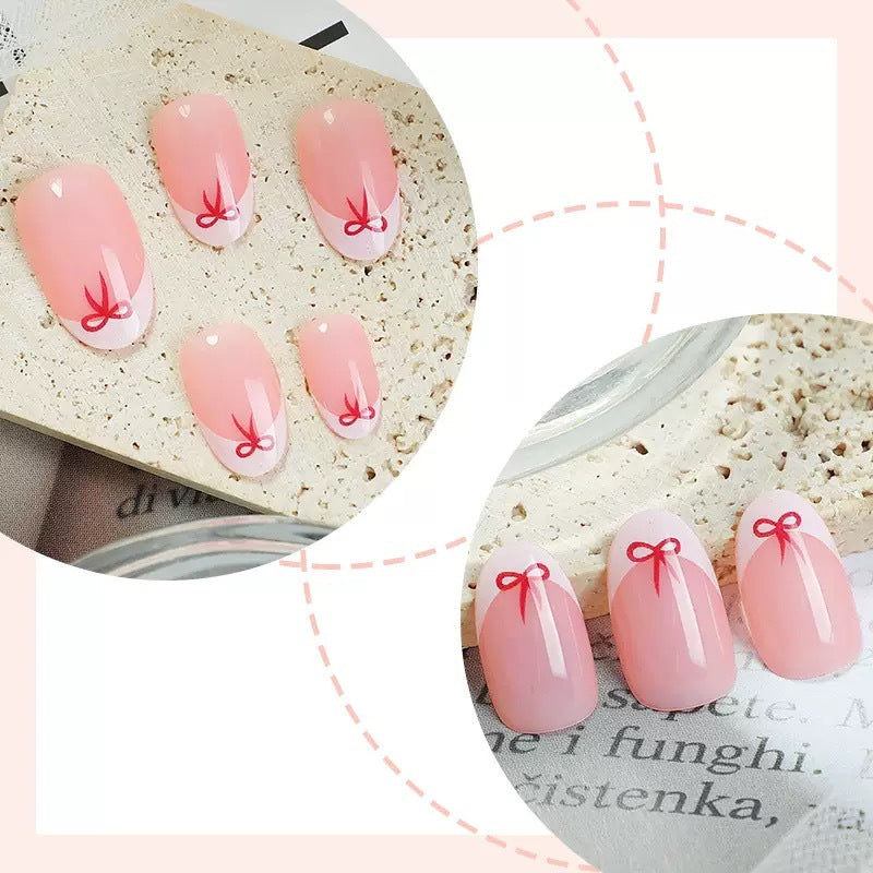 Artificial nail set with elegant bows and French tips Stornfield