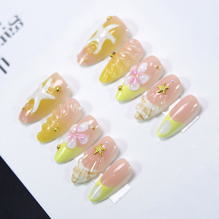 Artificial nail set with maritime shell and flower motifs Stornfield