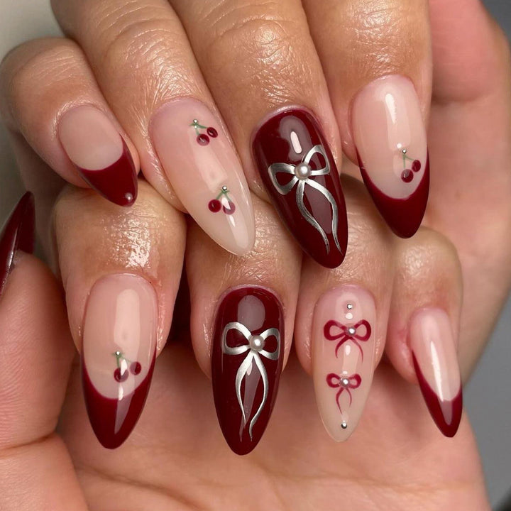 Glamorous stiletto nails with delicate accents Stornfield