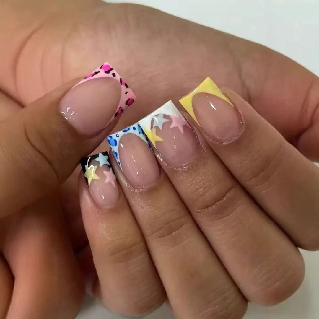 Acrylic nail set with colorful star motifs and modern accents Stornfield