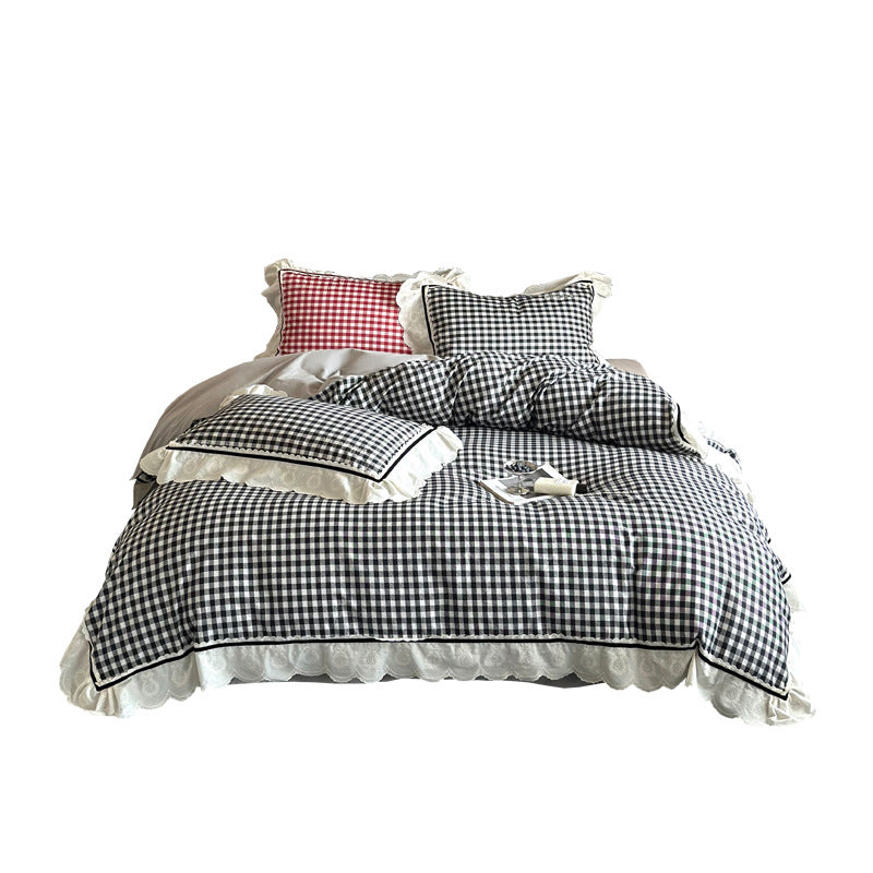 Quilted bedding set made of cotton blend with check pattern and decorative lace ruffle