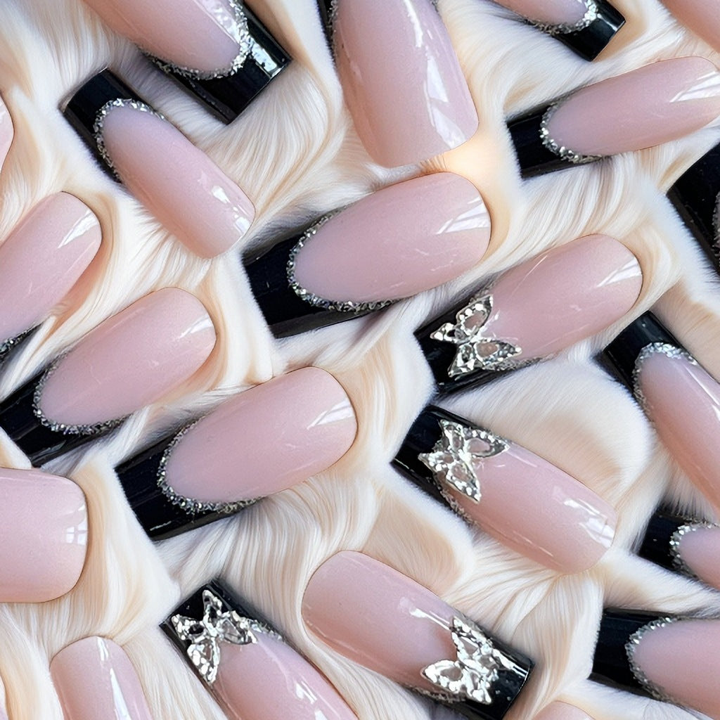 Glamorous Stiletto Nail Extensions with Butterfly Accents Stornfield