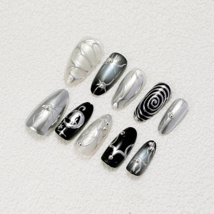 Artificial nails with metallic effects and complex designs Stornfield